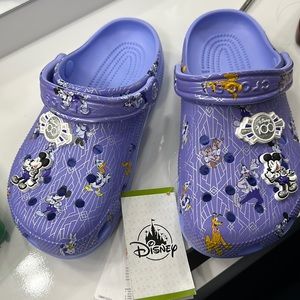 Never Worn , Disneys 100th celebration crocs